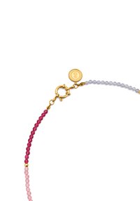 Colorful crystal bead bracelet with a gold clasp, featuring alternating deep pink and light purple beads, and a gold accent tag.