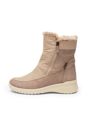 Beige Knöchelboot mit einem gepolsterten Textil-Obermaterial, Kunstfellbesatz und seitlichem Reißverschluss. Wildlederakzente und strukturiertes Gummisohle für besseren Halt.