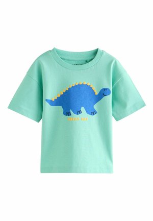 T-shirt à manches courtes vert clair mettant en avant un graphisme de dinosaure bleu avec des épines jaunes et le texte "GREAT DAY" en jaune en dessous.