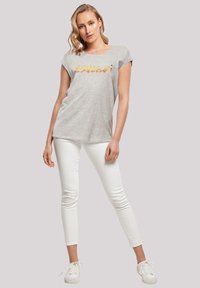 F4NT4STIC LOONEY TUNES TWEETY PIE - T-shirt z nadrukiem