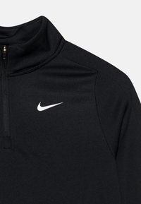 Black Nike pullover with a high collar, featuring a white logo on the left chest. Made from a smooth, lightweight fabric with a fitted design.