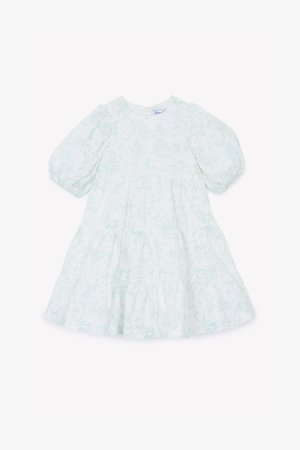 Svetlo zelena cvetna obleka iz lahkega materiala, z napihnjenimi rokavi, plastenasto krilo in okruglim izrezom ter gumbom na hrbtni strani.