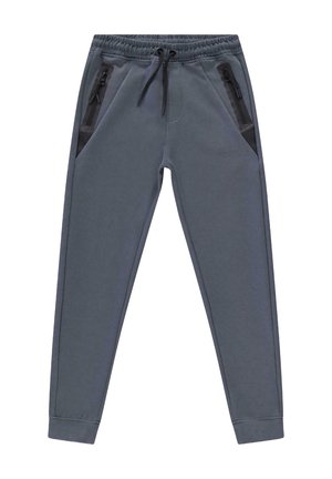 Grijze joggingbroek met een elastische tailleband, trekkoord en twee zijzakken met rits, voorzien van zwarte accenten aan de zakranden.