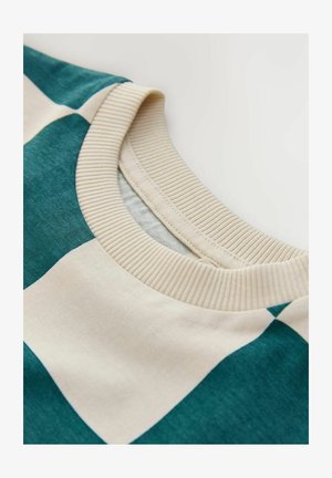 Puuvillast ümara kaelusega kampsun, millel on vahelduvad rohelised ja kreemjad triibud, sooniline krae ja sileda tekstuuriga.