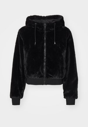 Black hooded jacket made of soft, plush fabric, featuring a front zipper and ribbed cuffs and hem with adjustable drawstrings.