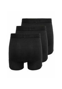 Black cotton boxer briefs showing three pairs stacked, featuring a smooth texture and an elastic waistband with embossed branding.