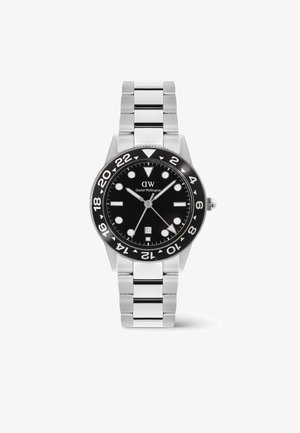 Silberne Metallarmbanduhr mit schwarzem Zifferblatt, weißen Stundenmarkierungen, Datumsanzeige und 24-Stunden-Drehlünette, Marke Daniel Wellington.