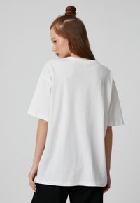 Buy Koton Printed Crew Neck Short Sleeves Crop T Shirt In Black