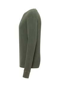 Langærmet skjorte i mørke olivengrøn, lavet af struktureret stof med rund halsudskæring og tætsiddende manchetter, der viser et enkelt design og minimal branding.