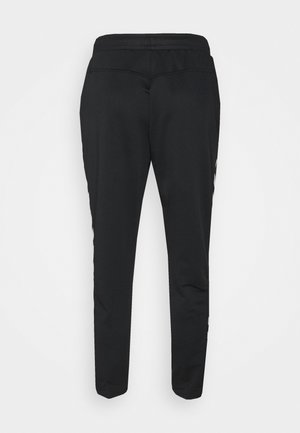 Pantalones deportivos negros con un corte ajustado, cinturilla elástica y rayas laterales. Hechos de una tela suave con una textura mate.