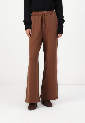 VINTAGE TRIANGLE - Tracksuit bottoms - amos brown