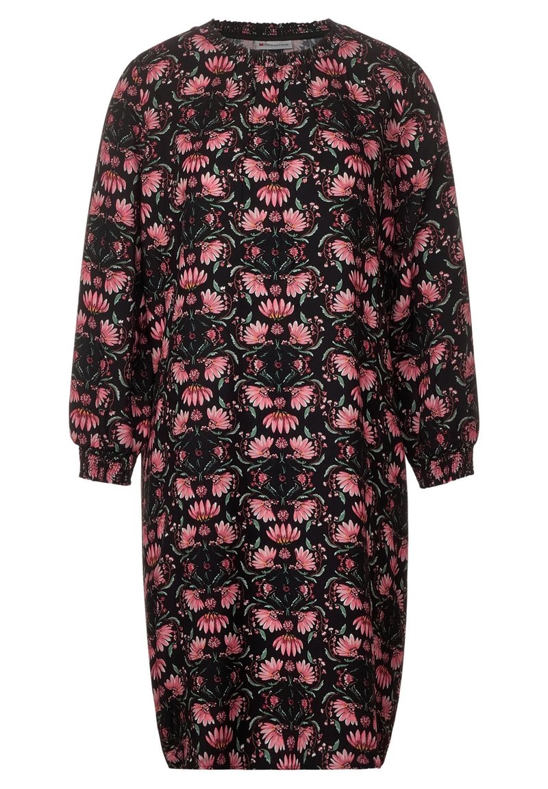 Czarna sukienka w kwiatowy wzór z różowymi i zielonymi kwiatami. Długie rękawy z elastycznymi mankietami, okrągły dekolt i luźny krój.