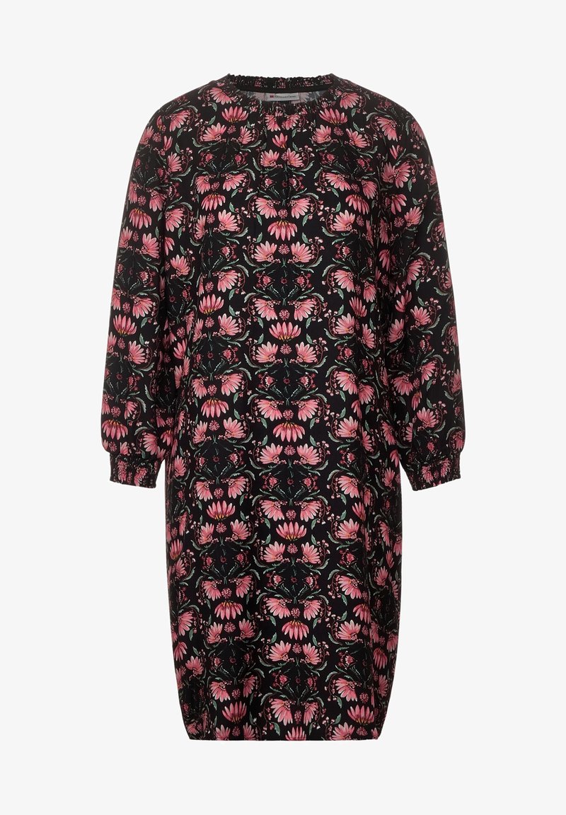 Czarna sukienka w kwiatowy wzór z różowymi i zielonymi kwiatami. Długie rękawy z elastycznymi mankietami, okrągły dekolt i luźny krój.
