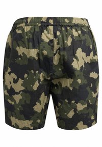 Camouflage shorts in dark green, black, and khaki. Made of lightweight fabric with an elastic waistband and a relaxed fit.