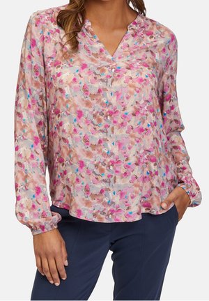 Florale Bluse mit V-Ausschnitt, langen Ärmeln und elastischen Bündchen, in Rosa- und Grautönen mit blauen Akzenten, aus leichtem Stoff gefertigt.