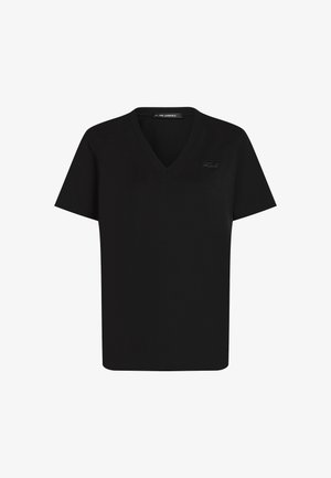 T-shirt noir à manches courtes avec col en V, subtilement brodé "Karl" sur la poitrine gauche et étiquette de marque à l'intérieur du col.