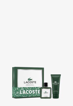 Coffret parfum Lacoste Original avec boîte verte et blanche, flacon d'eau de parfum et tube de gel douche vert assorti.
