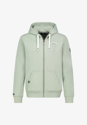 Hellgrüner Reißverschluss-Hoodie aus weicher Baumwolle, mit großer Kapuze, weißen Kordeln, Fronttaschen und Logo-Details auf der Brust und dem Ärmel.