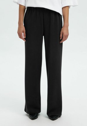 RELAXED FIT - Pantalon classique - black