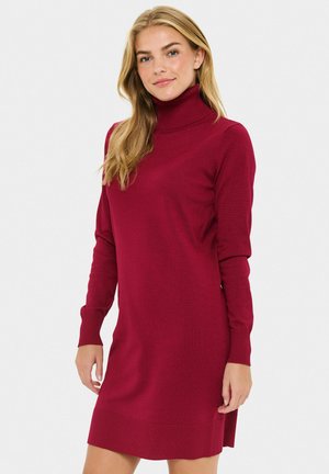 Bordeauxfarbenes Rollkragenkleid mit langen Ärmeln, gerippten Bündchen und Saum, glatter Textur, knielangen Schnitt. Schlichte und taillierte Silhouette.