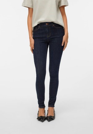 Vero Moda, Skinny fit VMFLASH Mid rise - Jeans Skinny - dark blue denim