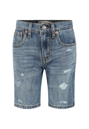 Blå cowboyshorts med slidte pletter, forreste knap, lynlås og fem-lomme design på en hvid baggrund.