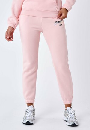 BRODÉ - Pantalon de survêtement - rose