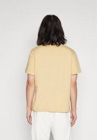 Lacoste Pamata T-krekls - croissant