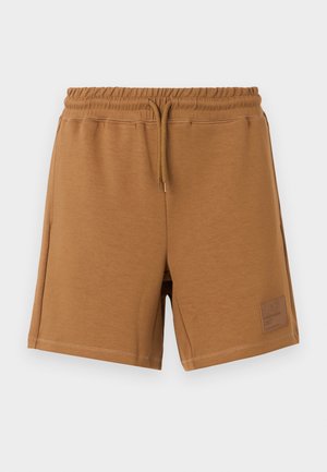 Brune bomulds shorts med elastisk talje og snor, med en struktureret applikation med logo detalje på den nedre højre side.