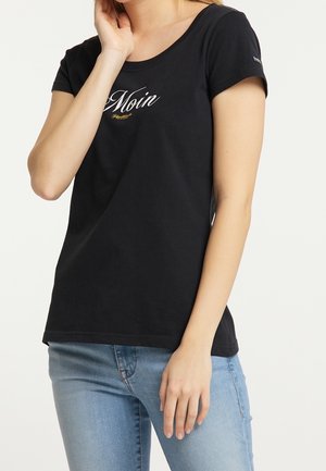 Zwart katoenen T-shirt met een ronde hals, korte mouwen en de tekst "Moin" in witte letters aan de voorkant.