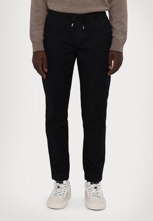 TRAVEL - Bukse - black