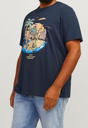 Navy blue short-sleeve t-shirt featuring a graphic of a skeleton playing guitar on a beach with palm trees, sand, and a sunset background.