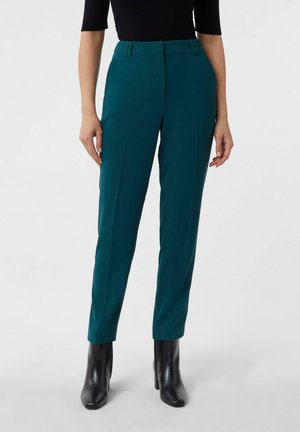 - Spodnie materiałowe