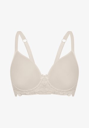 Beiger gepolsterter BH mit Spitzenband am unteren Rand, verstellbaren Trägern und einer glatten Textur. Verfügt über ein dekoratives Schleifendetail in der Mitte.