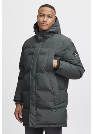 Padded dark gray coat featuring a high collar, front pockets, and ribbed cuffs. Material appears smooth with a glossy finish.