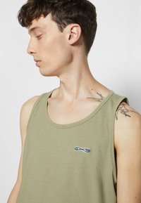 Nudie Jeans RELAXED TANK UNISEX - Top - faded green