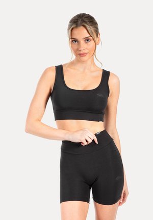 ADELYNN - Sport-BH med medium stöd - schwarz