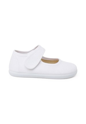 Scarpa Mary Jane bianca con ampia fascia regolabile a strappo e suola piatta in gomma per facilità di calzata e comfort.