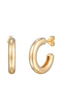 Goldfarbene Creolen mit einem glatten, runden Design. Dick und poliert, mit einem kleinen Verschluss. Leicht und mit hohlem Inneren.