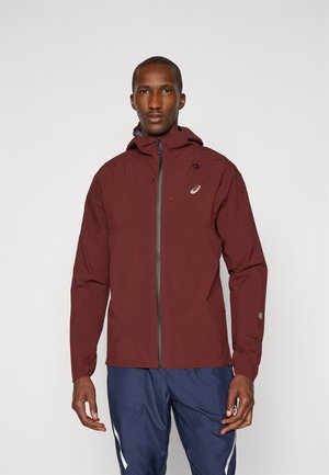 Rote Windjacke mit Reißverschluss vorne, verstellbarem Kapuzenkragen und grauen Akzenten. Verfügt über ein elegantes Design und leichtes Material.