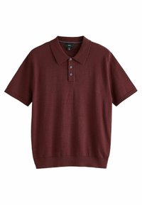 Polo de manga corta burdeos hecho de una tela suave, con un collar clásico, una tapeta de tres botones y dobladillos ribeteados en la parte inferior y en los puños.
