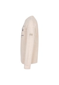 Camicia a maniche lunghe beige chiaro realizzata in tessuto morbido, con scollatura a girocollo, testo stampato in blu scuro e un'etichetta sulla manica sinistra.