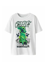 Camiseta blanca de algodón con un gráfico pixelado verde de Creeper, texto "Creeper" en negro y verde, y detalles temáticos de Minecraft en la parte inferior.