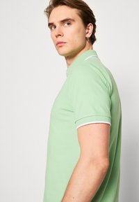 BOSS PASSERTIP - Polo shirt - open green