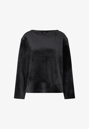 Haut noir à manches longues en velours doux, avec un décolleté rond et une coupe décontractée légèrement cropped.