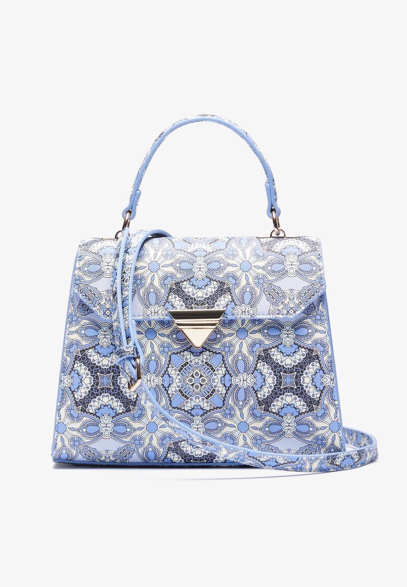Sac à main bleu à motifs avec des dessins floraux et géométriques complexes. Fabriqué en matériau texturé avec une poignée supérieure et une bandoulière amovible.