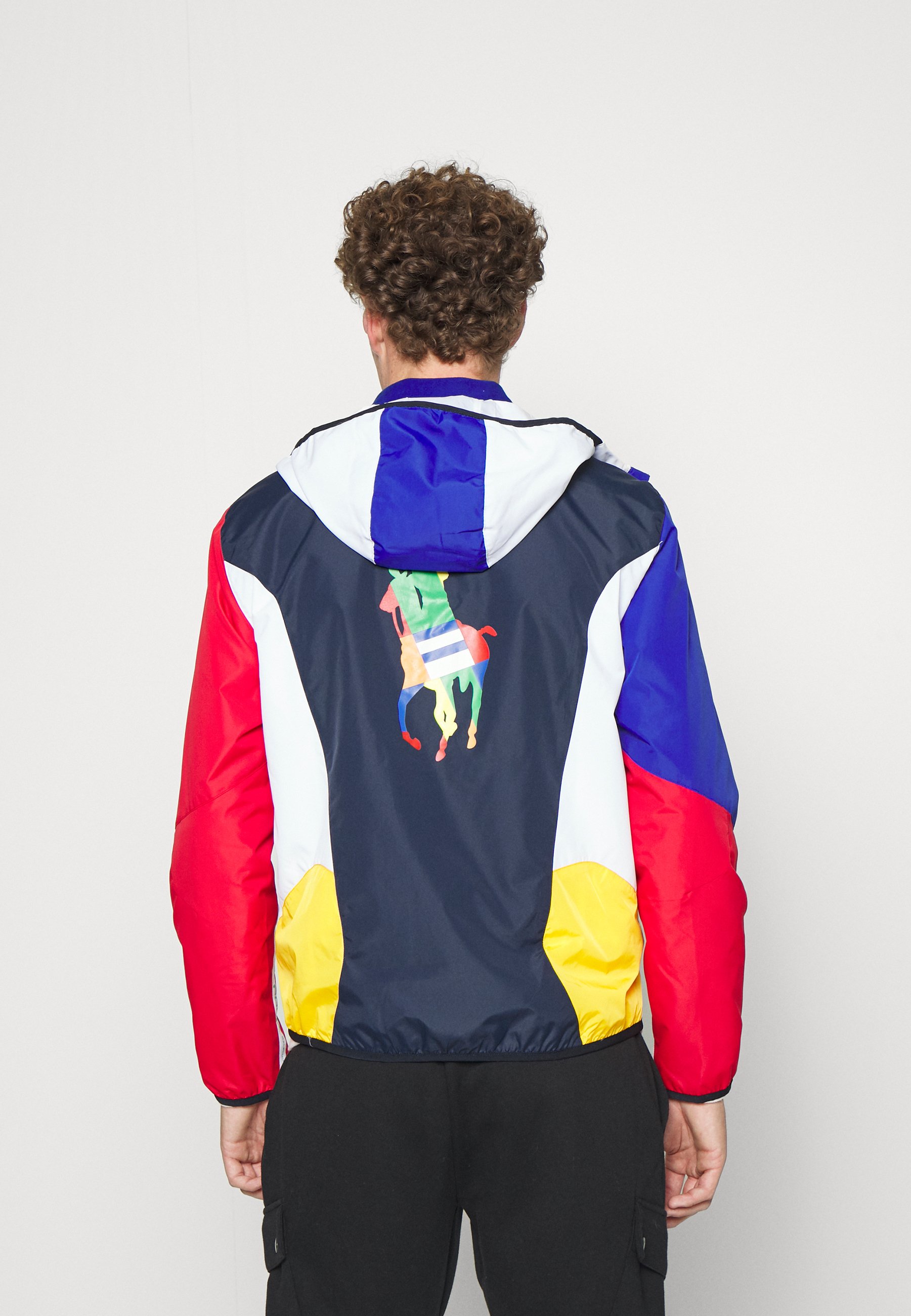 white polo windbreaker