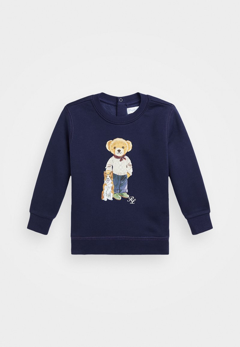 Felpa di cotone blu navy con maniche lunghe, caratterizzata da una grafica di un orso e un cane sul davanti. Collo rotondo con chiusura a pressione.