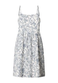 Floral dress in off-white fabric with blue botanical print. Features thin straps and a gathered waist, falling just above the knee.