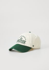 Baseballpet in crème katoen met een groene klep. Kenmerkt "A's" en "Athletics" in vette letters aan de voorkant. Inclusief genaaid logo.